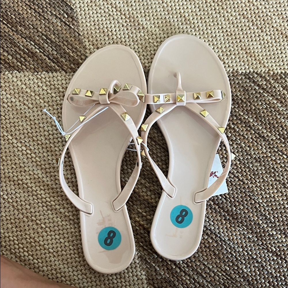 Stylish Beige Sandals with Gold Accents